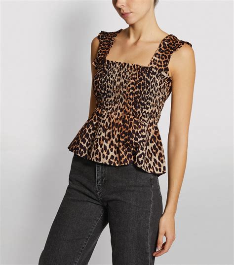 ganni leopard peplum top